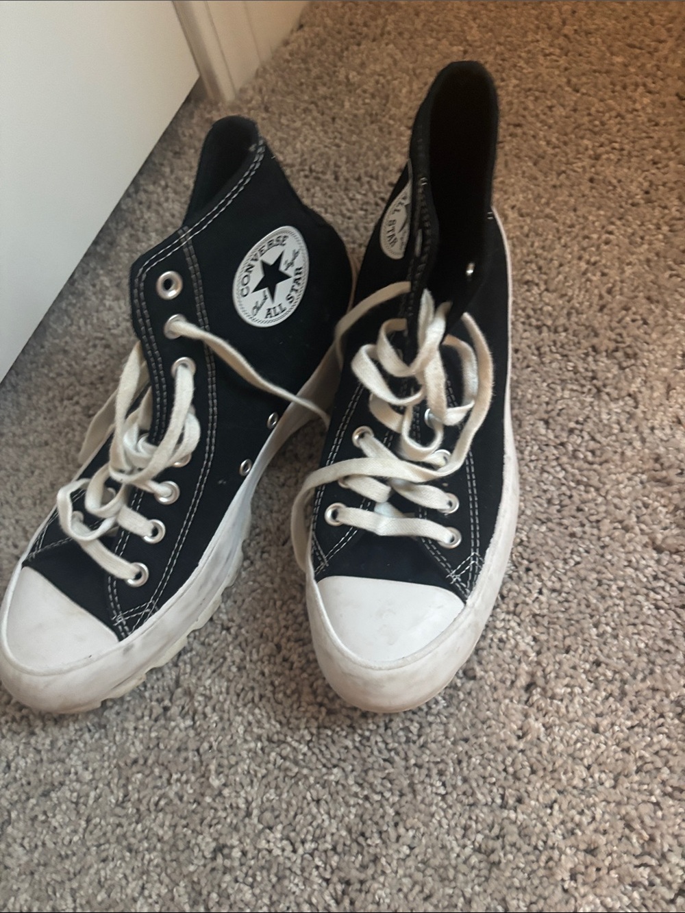 Converse Black and White High Top Athletic Shoes